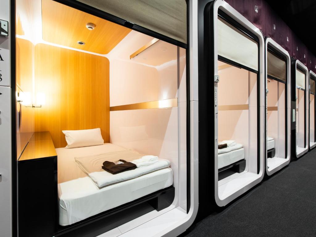 Enclosed cabin berth with a fitted headboard and a sliding panel